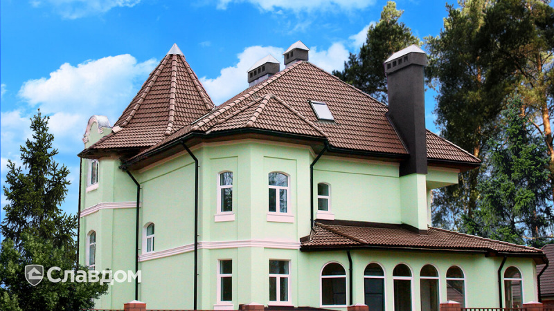 Частный дом с применением цементно-песчаной черепицы Braas Франкфурткая коричневый