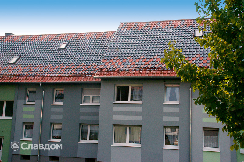 Крыша дома с узором из черепицы Creaton Futura Grau engobiert