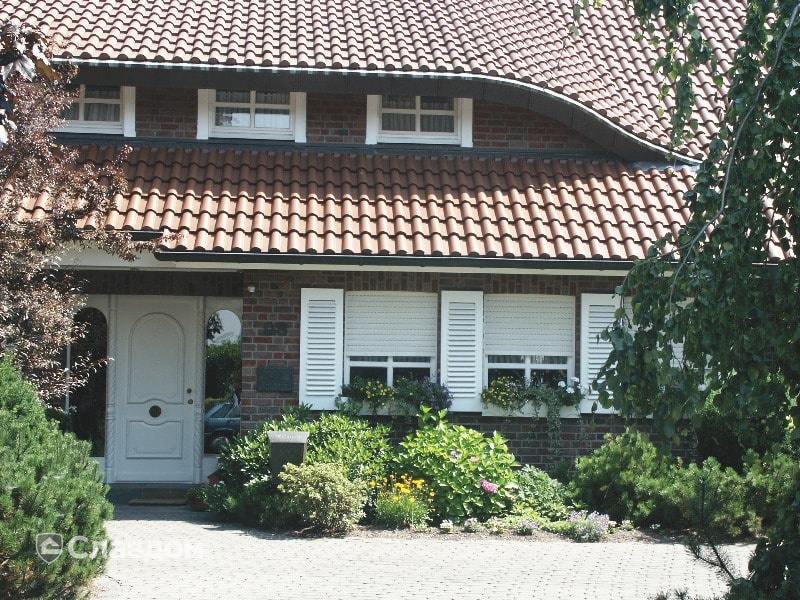 Частный дом с облицовкой кирпичом Terca Paarsblauw