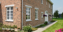 Двухэтажный дом с облицовкой из кирпича Terca Kastanjebruin