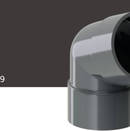 Колено 67 градусов KROP PVC для системы D 130/90 мм, RAL 8019